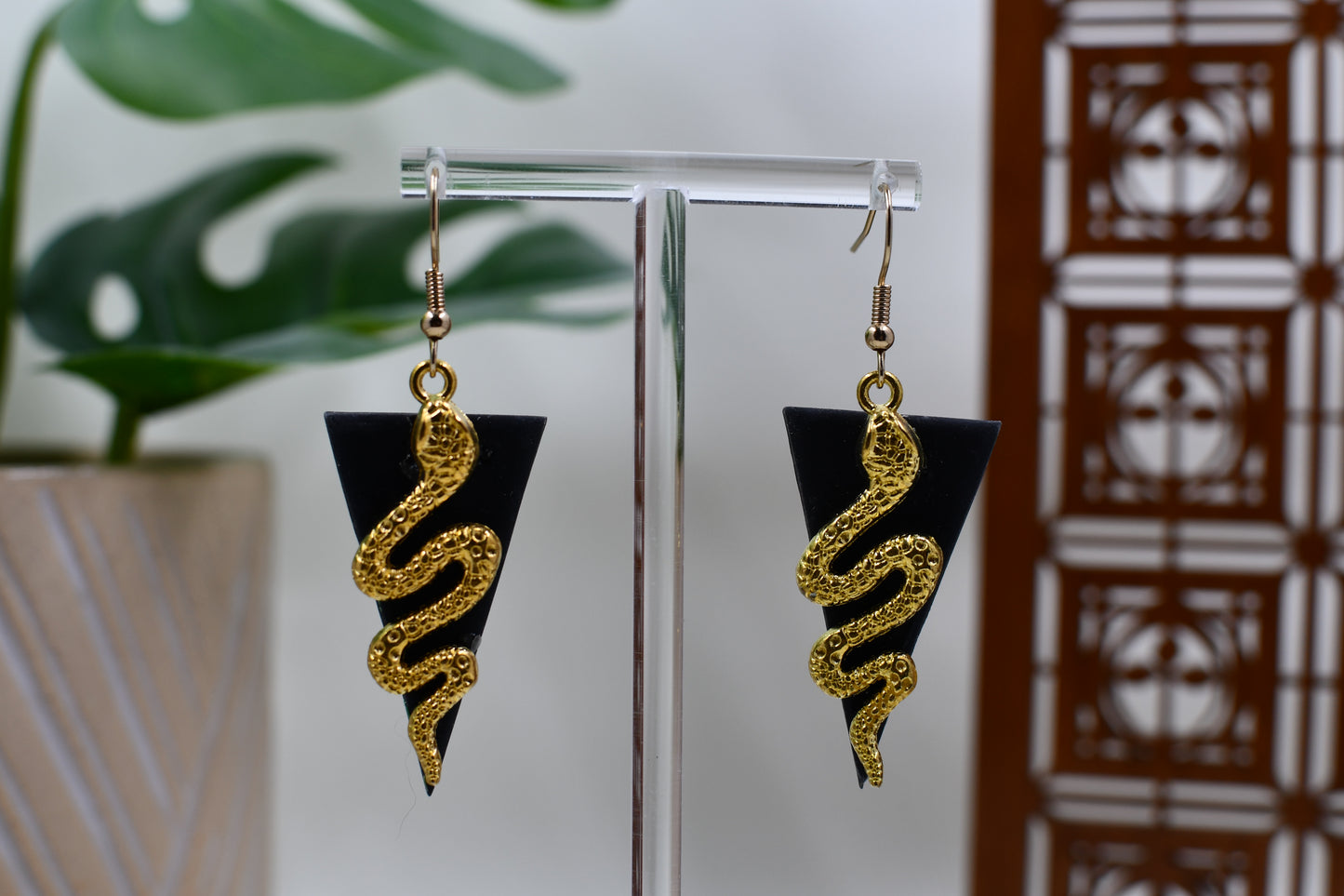 Black Era Gold Snake with Black Triangle Background Dangle Earrings