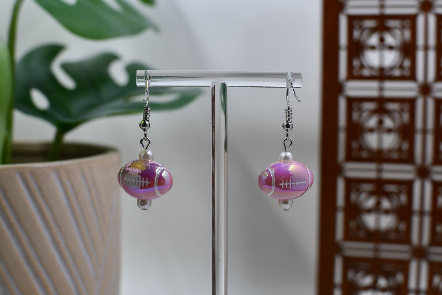 Light Pink Iridescent Acrylic Football Dangle Earrings
