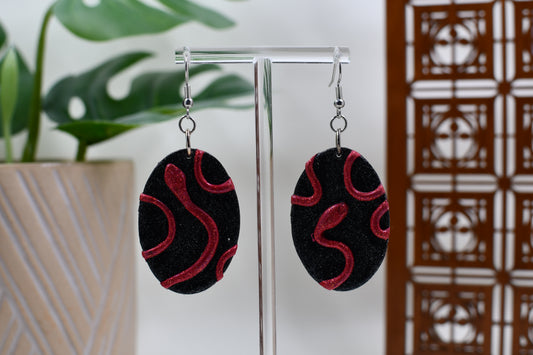 Black Era Glittery Red Snake Oval Dangle Earrings