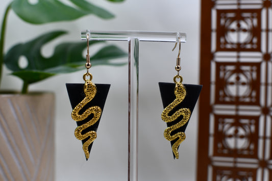 Black Era Gold Snake with Black Triangle Background Dangle Earrings