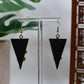 Black Era Gold Snake with Black Triangle Background Dangle Earrings