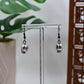 Spooky Silver Skull Dangle Earrings