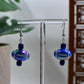 Blue Iridescent Acrylic Football Dangle Earrings