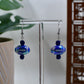 Blue Iridescent Acrylic Football Dangle Earrings