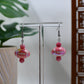 Medium Pink Iridescent Acrylic Football Dangle Earrings