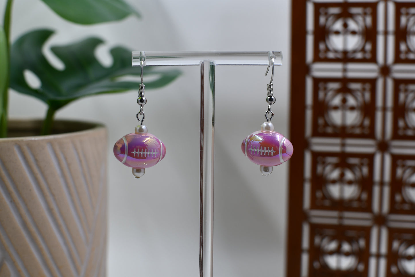 Light Pink Iridescent Acrylic Football Dangle Earrings