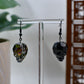 Black Glass Geometric Spooky Skull Dangle Earrings