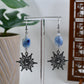 Silver Rhinestone Snowflake with Blue Glass Bead Dangle Earrings